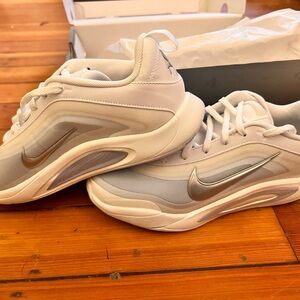 Aja Wilson's A1sNike White and Silver Sneakers